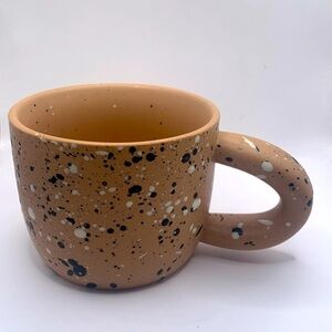 Mug speckled egg look black & white on Beige Mug w/ donut Handle Cup
